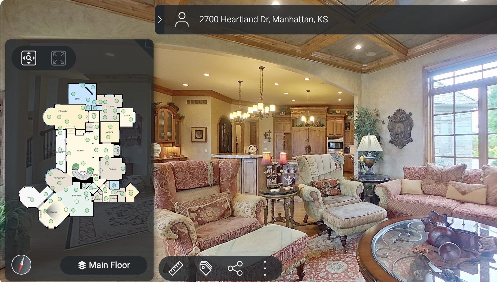 A computer screen showing an immersive 3D virtual tour of a home interior.